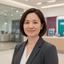 Weiwen Lacanaria, retail bank operations manager, standing in a Singapore branch lobby